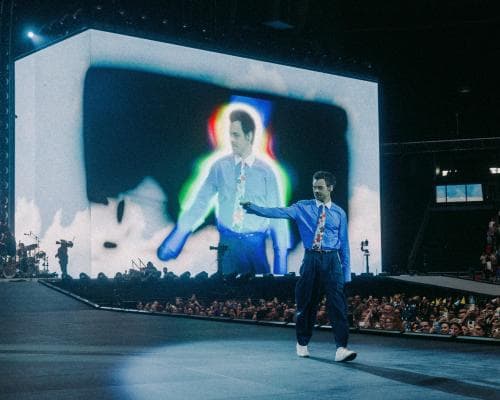 The Tie That Binds: How a Forgotten Corporate Staple Became the Ultimate Badge of Concert Royalty